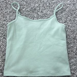 I am selling a mint green tank top